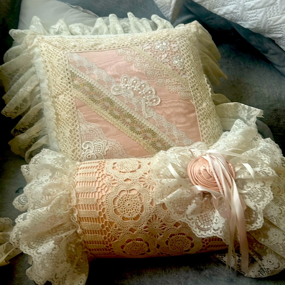 Three decorative pillows three of them